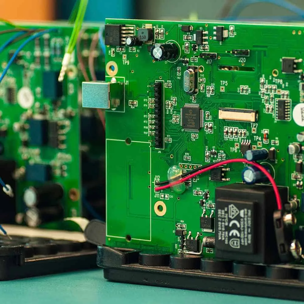 Controller boards connected in an equipment enclosure
