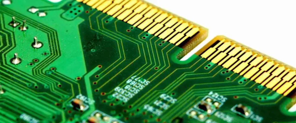 Circuit board edge fingers and neighboring traces